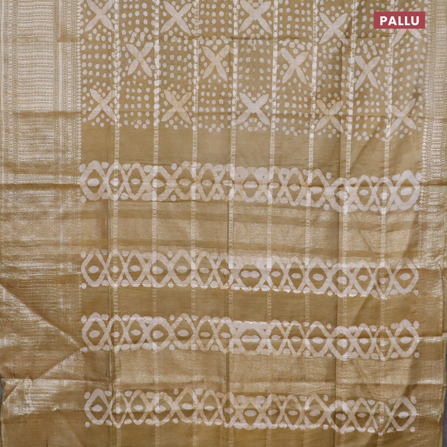 Semi tussar saree elaichi green with allover batik prints and long zari woven border