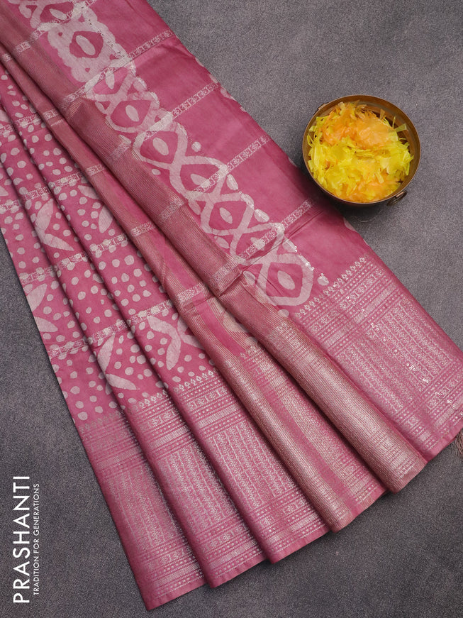 Semi tussar saree mauve pink with allover batik prints and long zari woven border