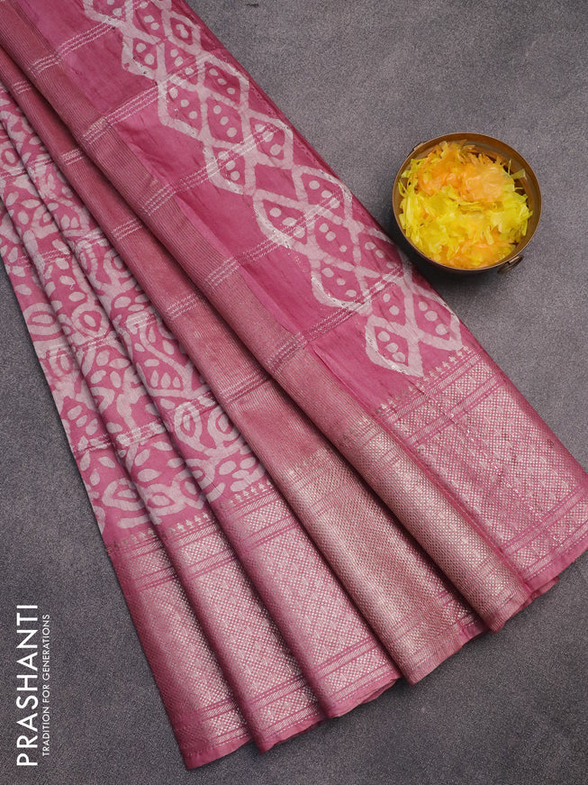 Semi tussar saree mauve pink and off white with allover batik prints and long zari woven border