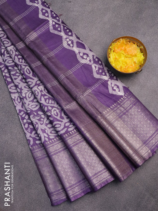 Semi tussar saree violet and off white with allover batik prints and long zari woven border