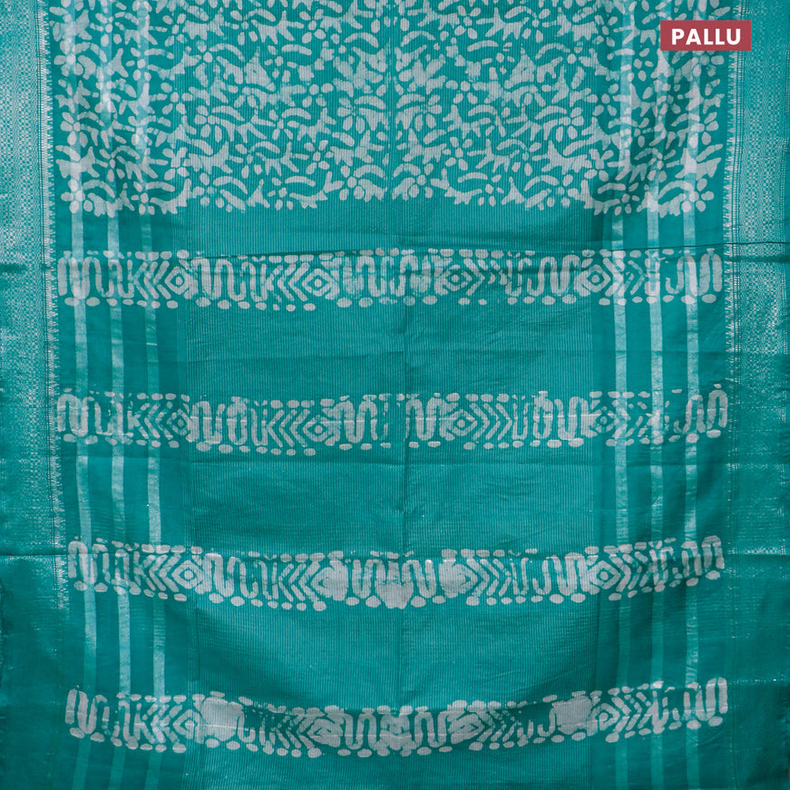 Semi tussar saree teal green and off white with allover batik prints and silver zari woven border
