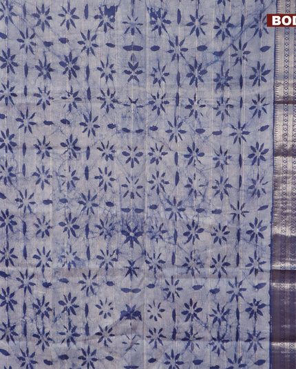 Semi tussar saree beige and blue with allover batik prints and long zari woven border