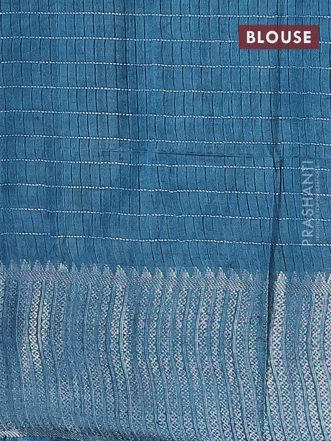 Semi tussar saree cs blue with allover batik prints & thread stripe weaves and long silver zari woven border