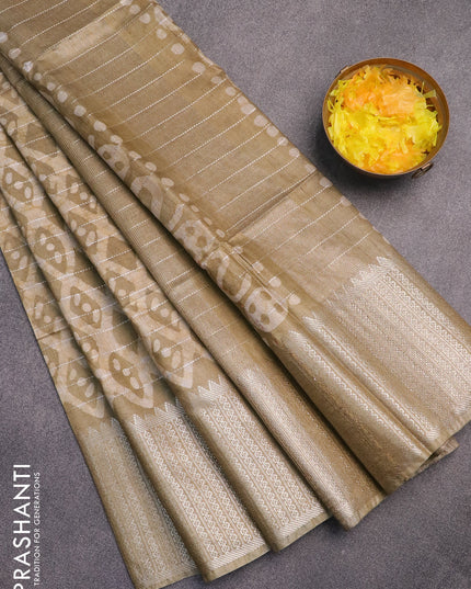 Semi tussar saree elaichi green with allover batik prints & thread stripe weaves and long silver zari woven border