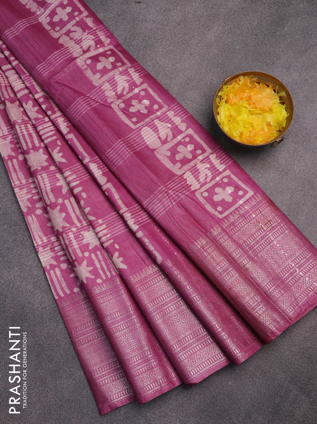 Semi tussar saree mauve pink and beige with allover batik prints and long silver zari woven border