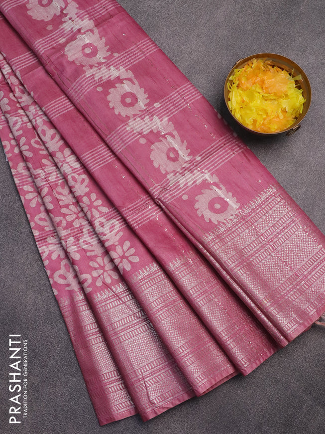 Semi tussar saree mauve pink with allover batik prints and long silver zari woven border