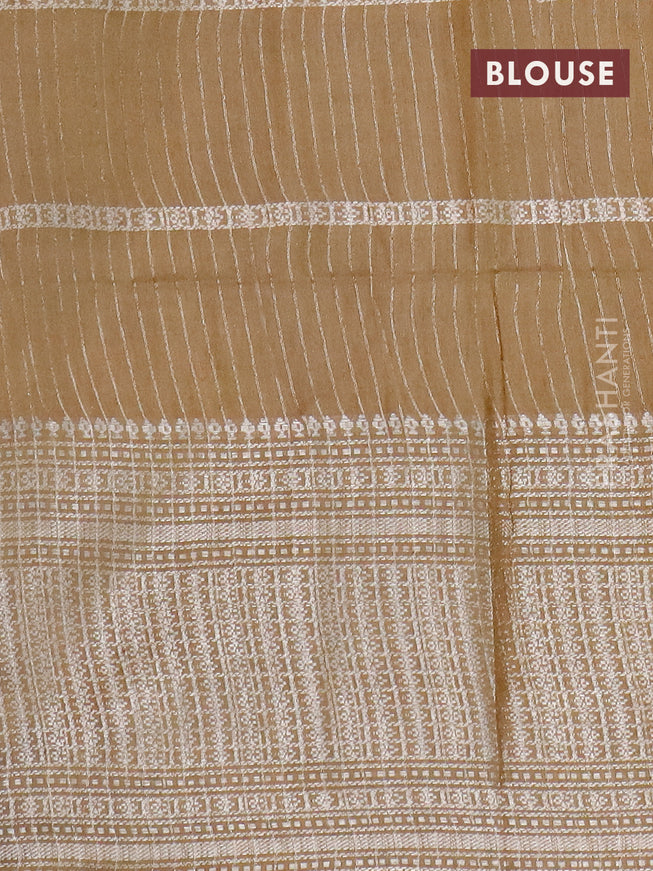 Semi tussar saree mehendi green with allover batik prints and long silver zari woven border