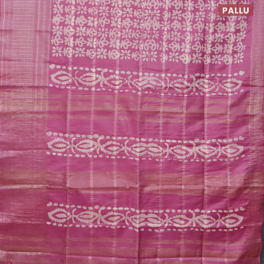 Semi tussar saree mauve pink with allover batik prints and long silver zari woven border