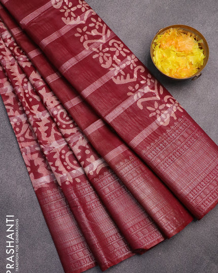 Semi tussar saree dark maroon and beige with allover batik prints and long silver zari woven border