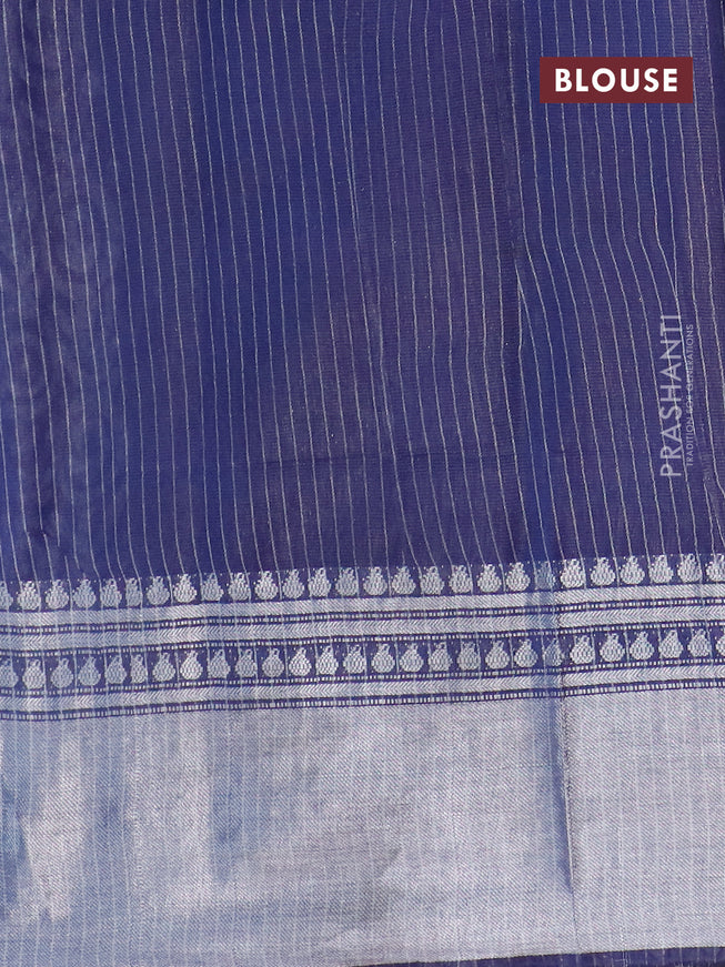 Semi tussar saree navy blue with allover batik prints and long silver zari woven border