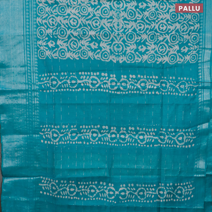Semi tussar saree teal green and beige with allover batik prints and long silver zari woven border