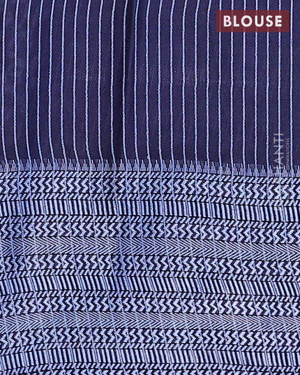Semi tussar saree navy blue with allover batik prints and long thread woven border
