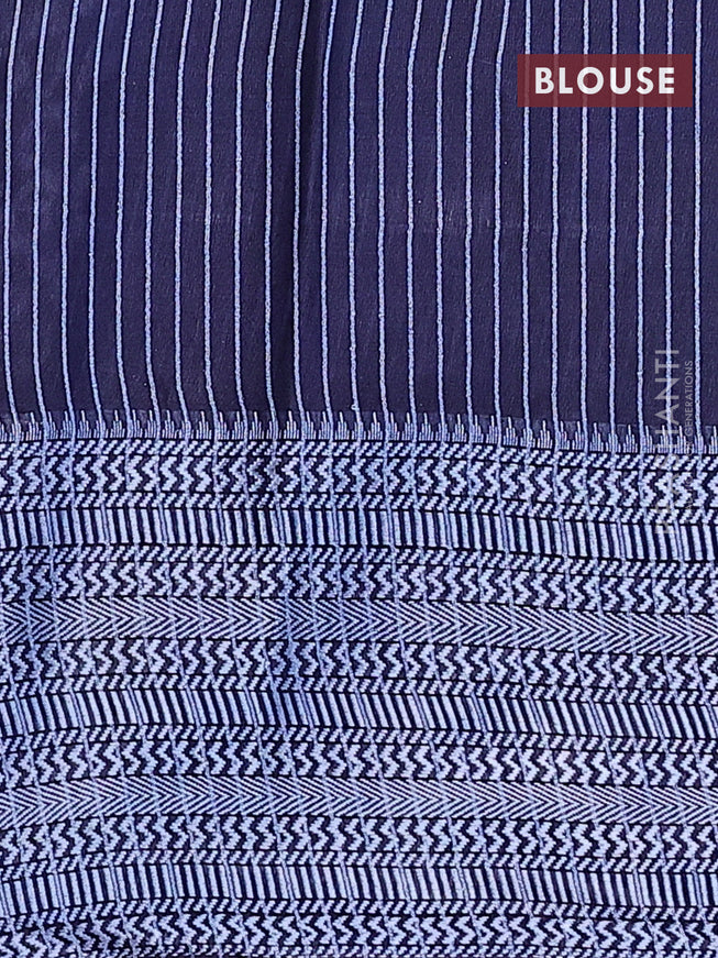 Semi tussar saree navy blue with allover batik prints and long thread woven border