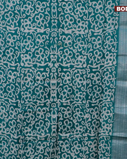 Semi tussar saree teal green and off white with allover batik prints and long thread woven border