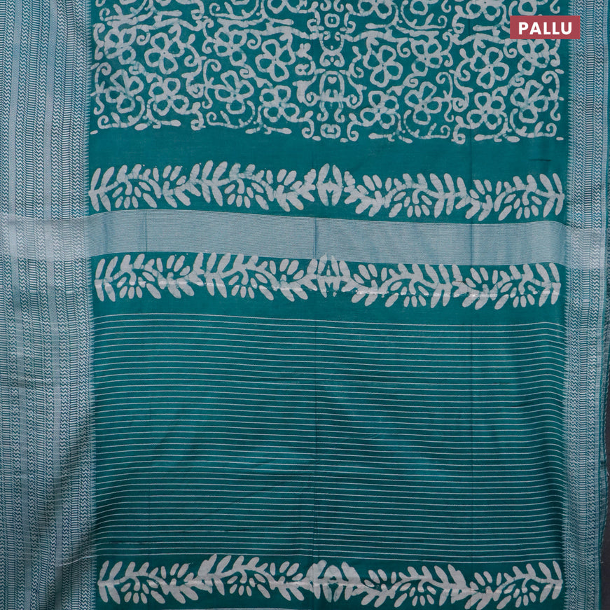 Semi tussar saree teal green and off white with allover batik prints and long thread woven border