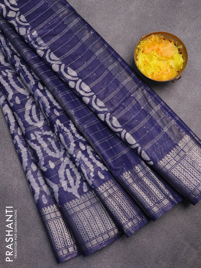 Semi tussar saree navy blue with allover batik prints and zari woven border