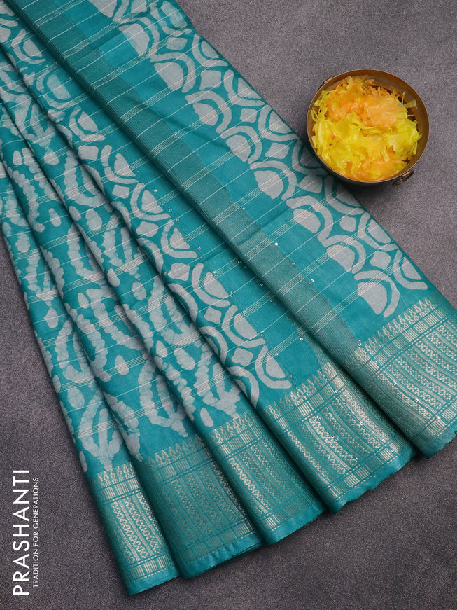 Semi tussar saree teal green and beige with allover batik prints and zari woven border