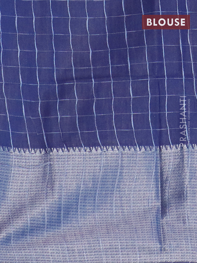 Semi tussar saree navy blue and off white with allover batik prints and long silver zari woven border