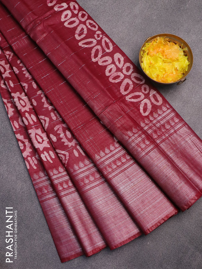 Semi tussar saree dark maroon with allover batik prints and long silver zari woven border