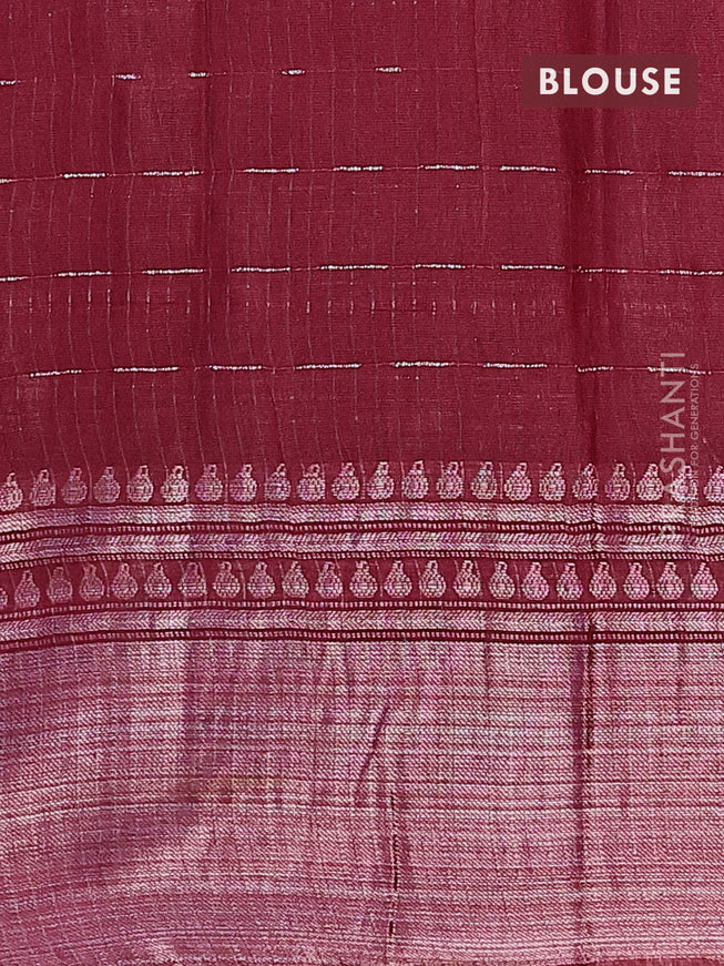 Semi tussar saree dark maroon with allover batik prints and long silver zari woven border