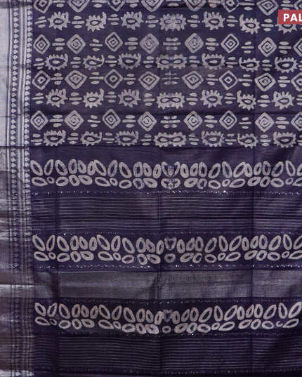 Semi tussar saree navy blue with allover batik prints and long silver zari woven border
