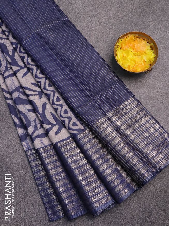Semi tussar saree off white and navy blue with allover batik prints and long zari woven border
