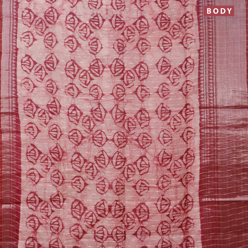 Semi tussar saree off white and maroon with allover batik prints and long zari woven border