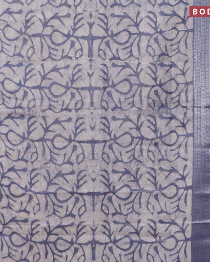 Semi tussar saree off white and grey with allover batik prints and long silver zari woven border