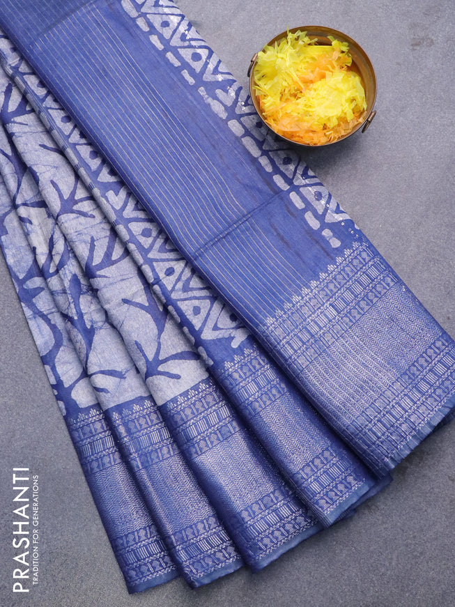 Semi tussar saree off white and navy blue with allover batik prints and long silver zari woven border
