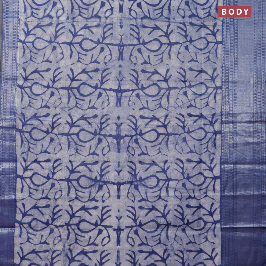 Semi tussar saree off white and navy blue with allover batik prints and long silver zari woven border