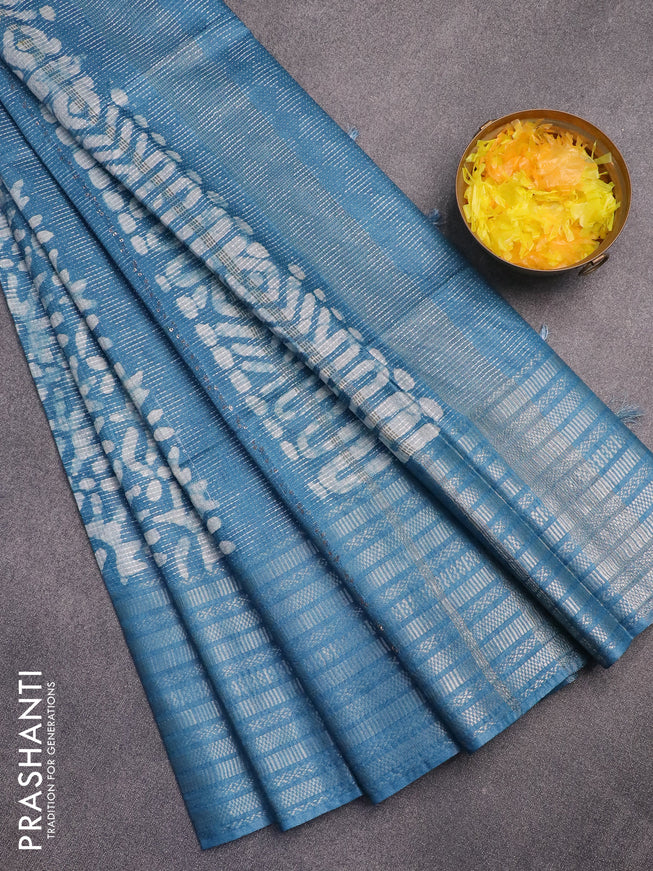 Semi tussar saree cs blue with allover batik prints & thread weaves and long silver zari woven border