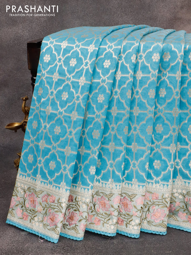 Banarasi cotton saree light blue with allover silver zari weaves and zari woven floral embroidery border