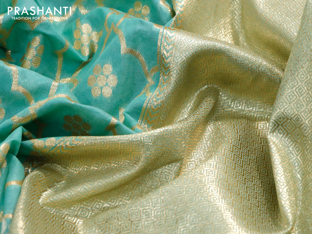 Banarasi cotton saree teal blue shade with allover zari weaves and zari woven floral embroidery border