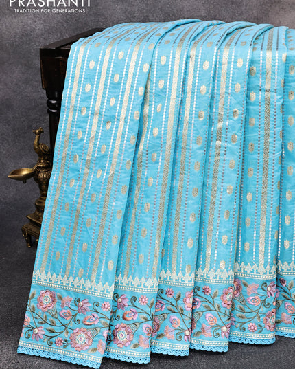Banarasi cotton saree light blue with allover silver & gold zari weaves and floral embroidery border