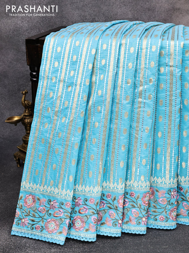 Banarasi cotton saree light blue with allover silver & gold zari weaves and floral embroidery border