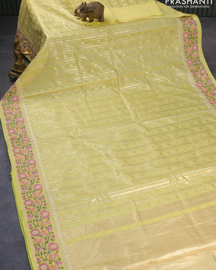 Banarasi cotton saree pale yelloew with allover silver & gold zari weaves and floral embroidery border