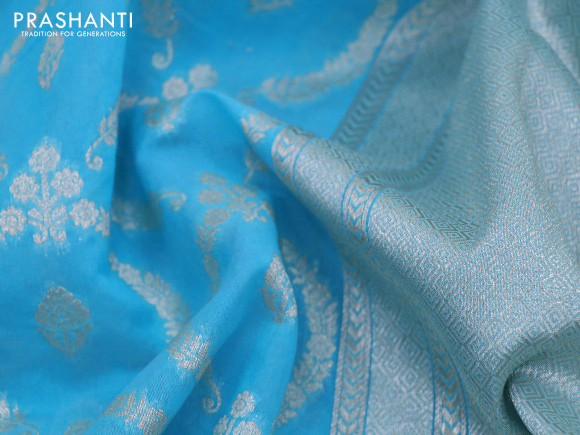 Banarasi cotton saree light blue with allover silver zari weaves and floral embroidery border