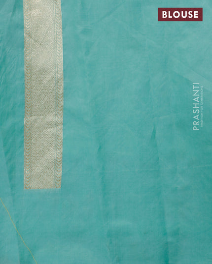 Banarasi cotton saree teal green with allover zari weaves and floral embroidery border