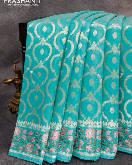 Banarasi cotton saree teal blue with allover zari weaves and floral embroidery border