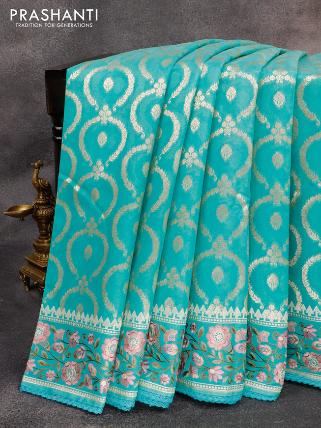 Banarasi cotton saree teal blue with allover zari weaves and floral embroidery border