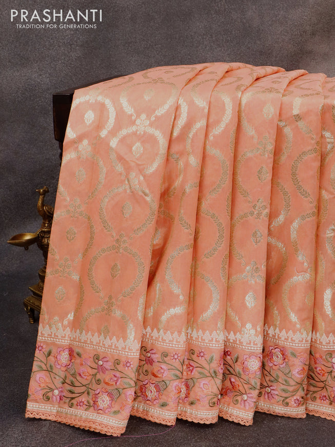 Banarasi cotton saree peach orange with allover zari weaves and floral embroidery border