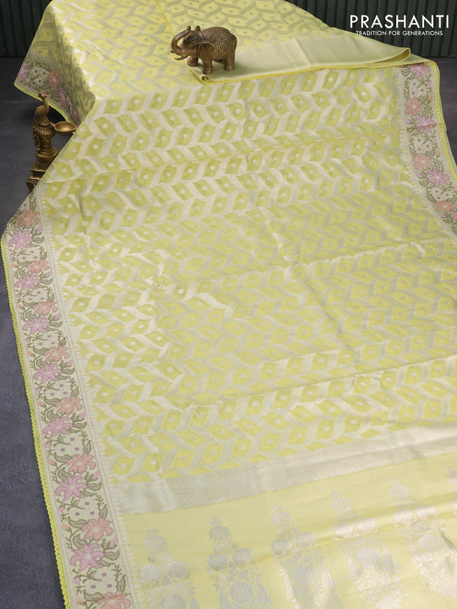 Banarasi cotton saree pale yellow with allover silver zari weaves and zari woven floral embroidery work border