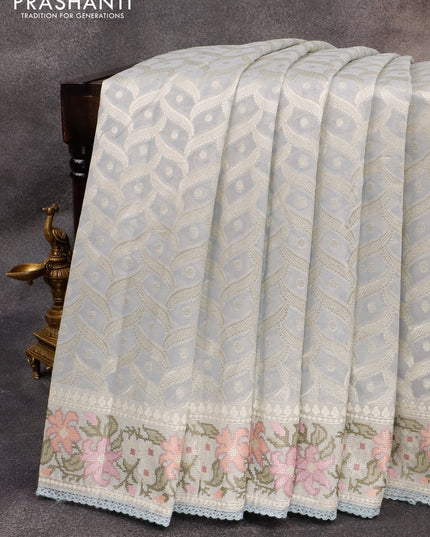 Banarasi cotton saree grey with allover silver zari weaves and zari woven floral embroidery work border