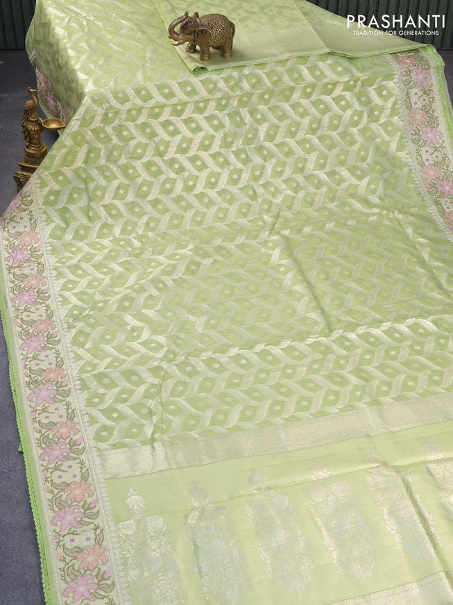 Banarasi cotton saree pista green with allover zari weaves and zari woven floral embroidery work border