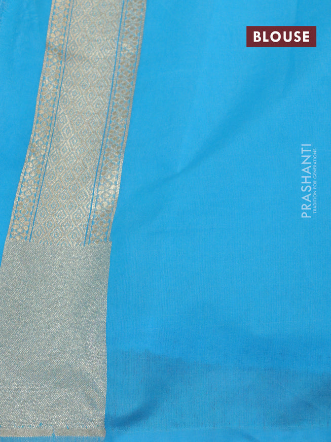 Banarasi cotton saree light blue with allover zari weaves and zari woven floral embroidery work border