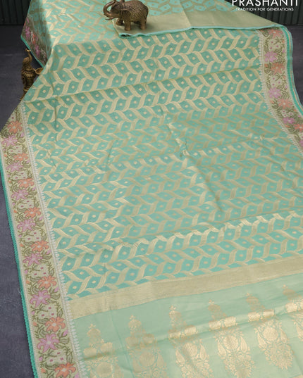 Banarasi cotton saree pasteal green with allover zari weaves and zari woven floral embroidery work border