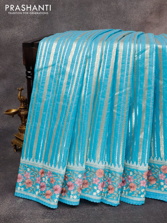 Banarasi cotton saree light blue with allover silver & gold zari weaves and zari woven floral embroidery work border