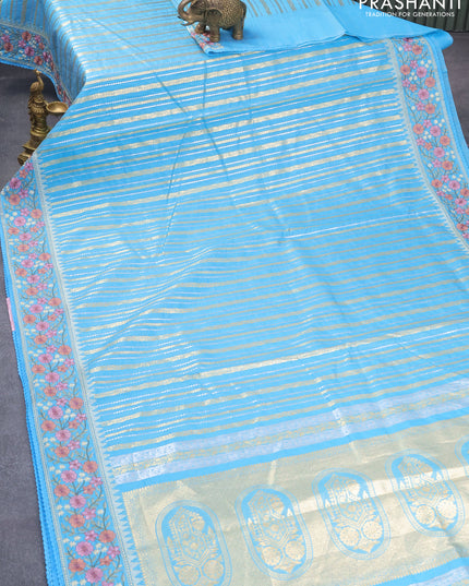 Banarasi cotton saree light blue with allover silver & gold zari weaves and zari woven floral embroidery work border