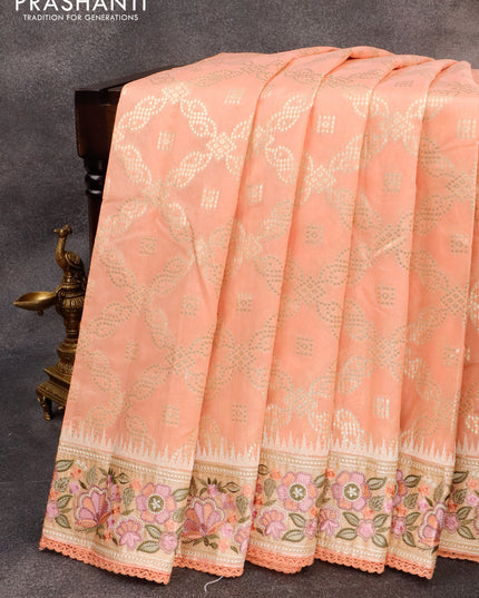 Banarasi cotton saree peach orange with allover zari weaves and zari woven floral embroidery work border