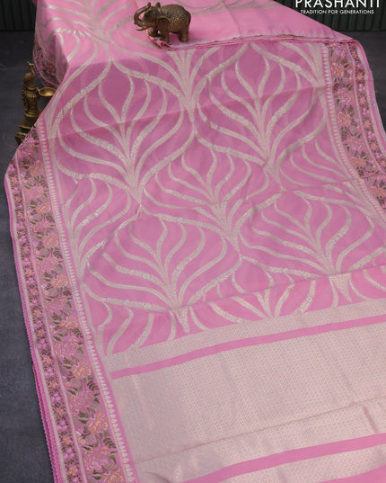 Banarasi cotton saree light pink with allover silver zari weaves and floral embroidery work border